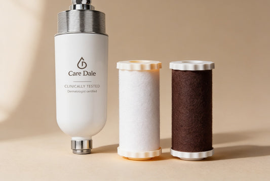 The Care Dale filter with its clinically tested label, beside a new white cartridge and a used brown one